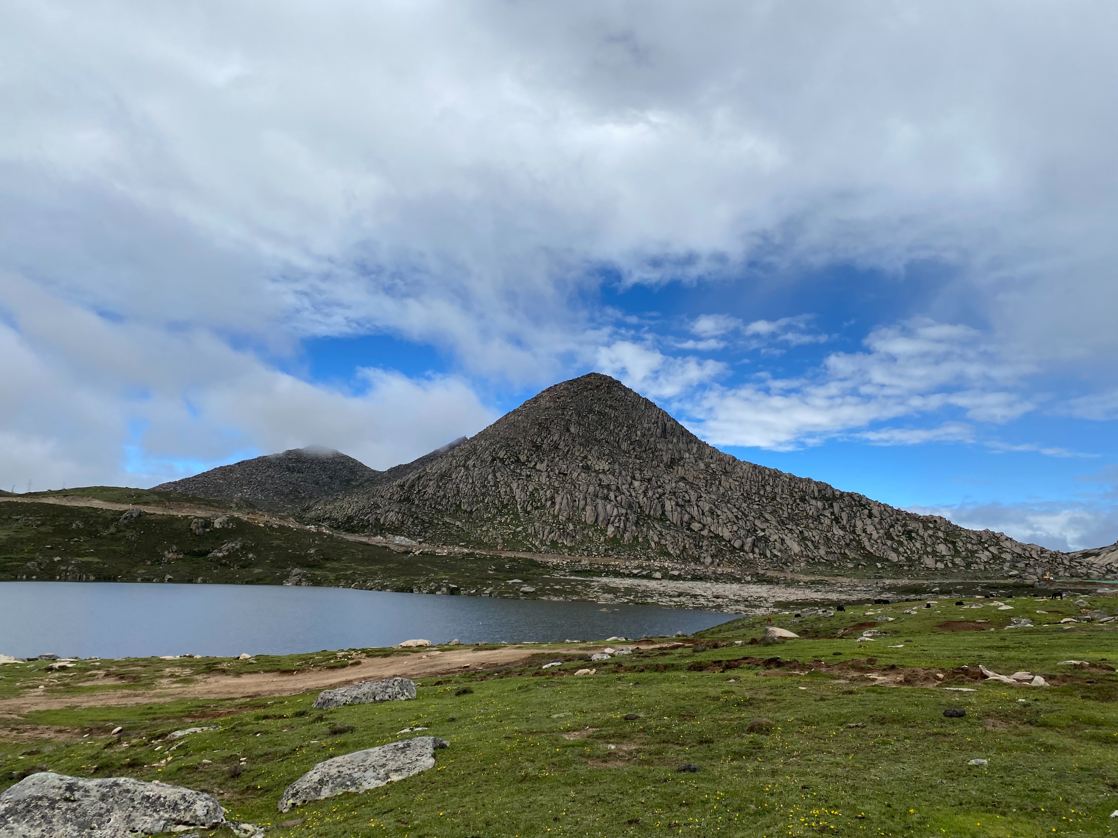 理塘格聂神山怎么走,理塘格聂神山故事