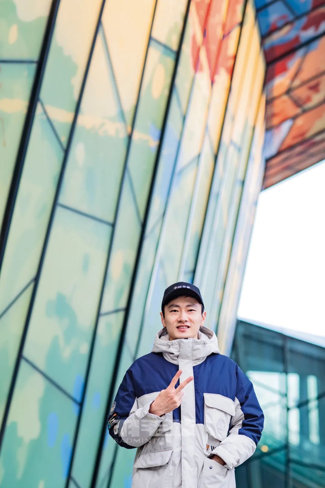 羽毛球比赛的封面,东京奥运会羽毛球男双国羽