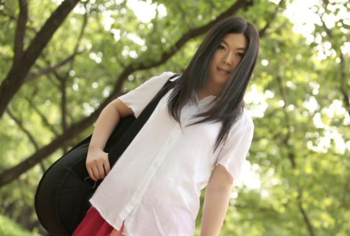 西单女孩“三级跳”：贫民女孩登上纽约时代大屏，她经历了什么